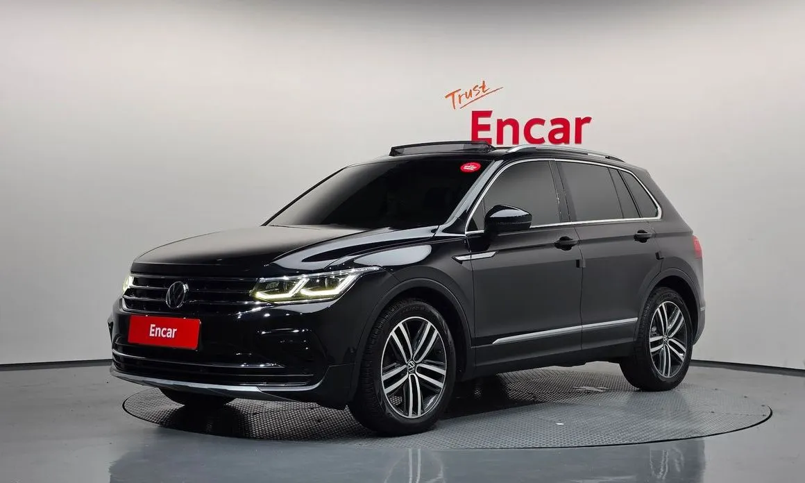 Volkswagen Tiguan — фото 1