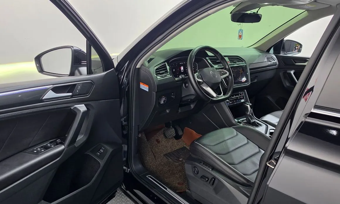 Volkswagen Tiguan — фото 6