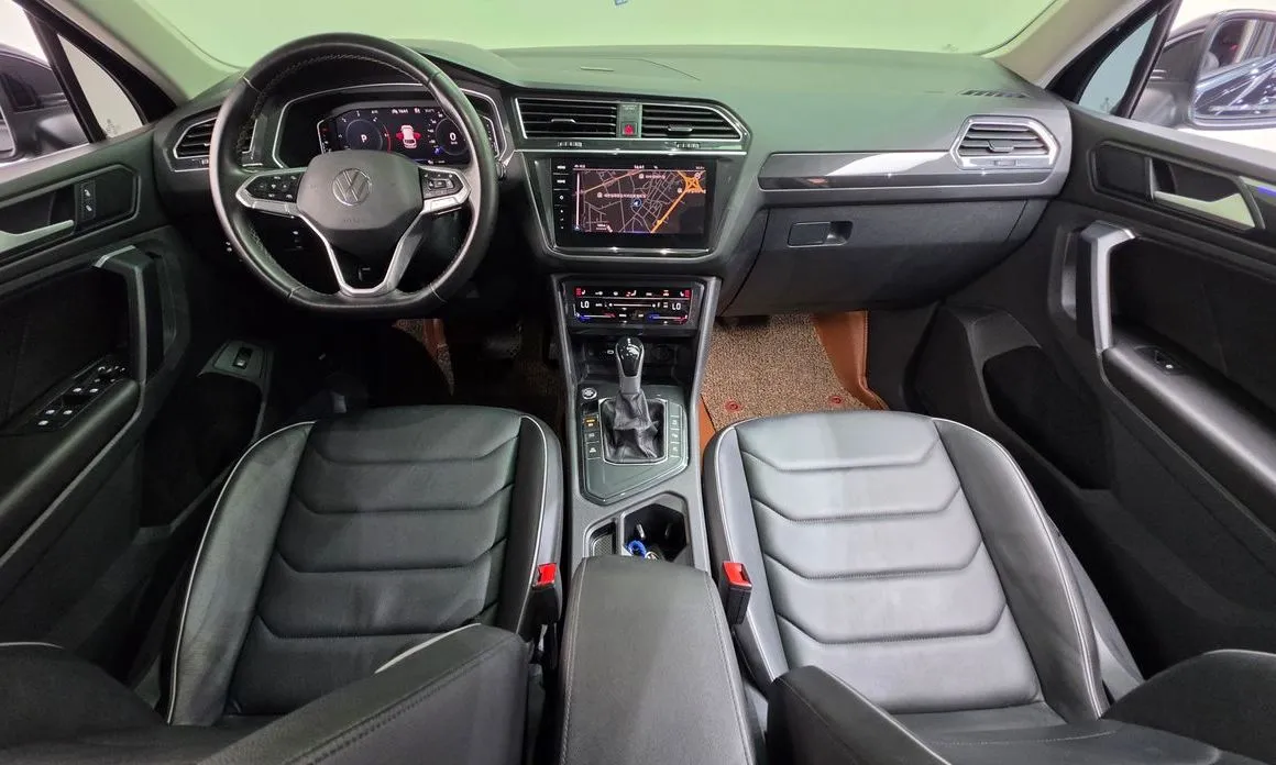 Volkswagen Tiguan — фото 5