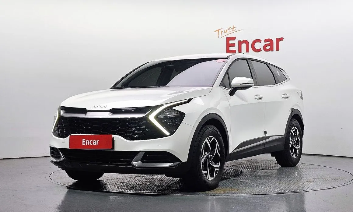 Kia Sportage — фото 1