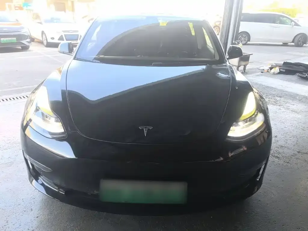 Tesla Model 3 — фото 7