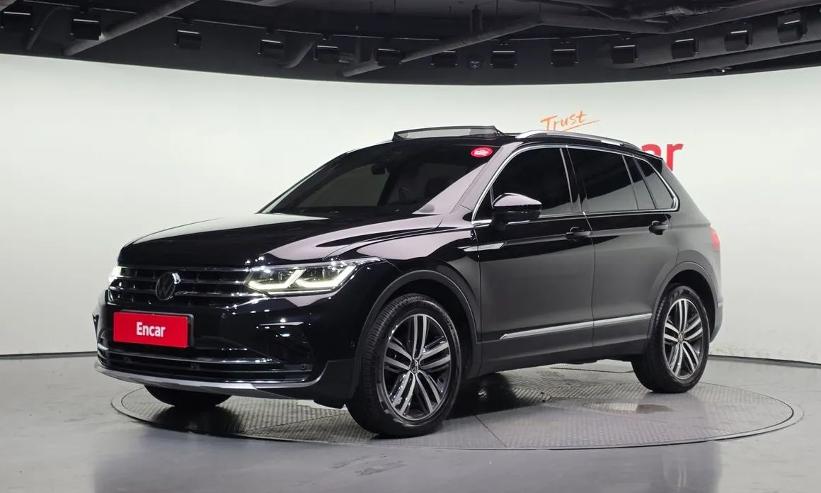 Volkswagen Tiguan — фото 1