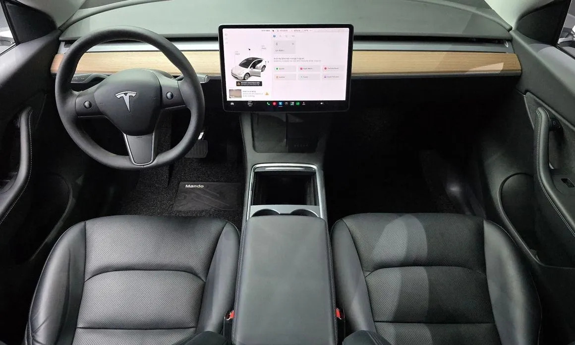 Tesla Model Y — фото 7