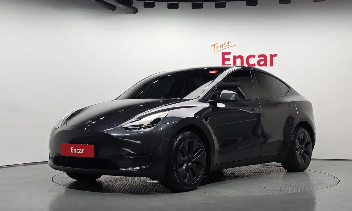 Tesla Model Y — фото 1