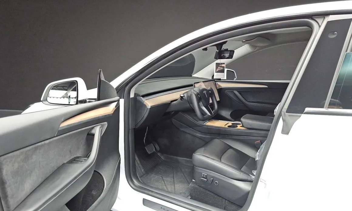 Tesla Model Y — фото 6