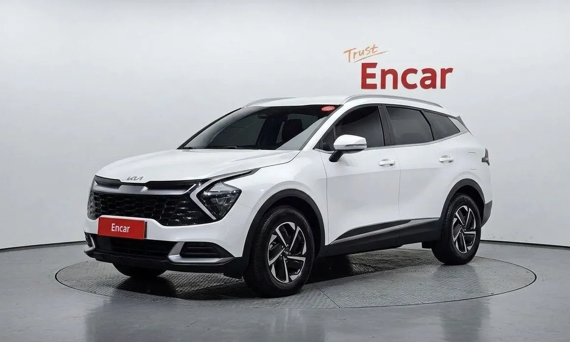 Kia Sportage — фото 1