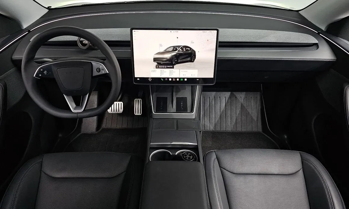 Tesla Model Y — фото 7