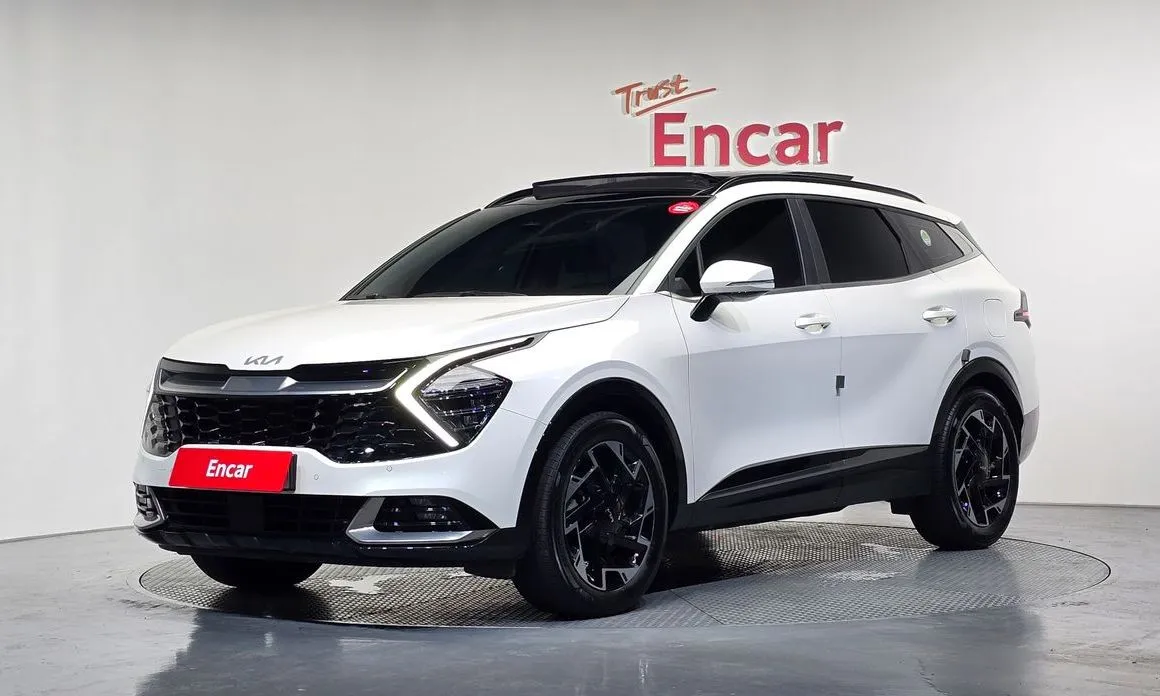Kia Sportage — фото 1
