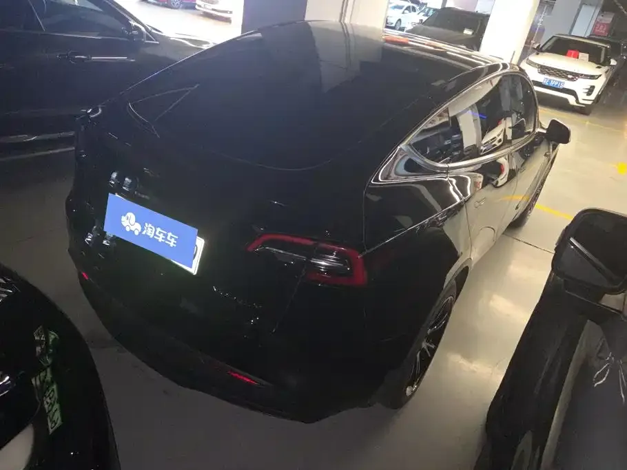 Tesla Model Y — фото 10