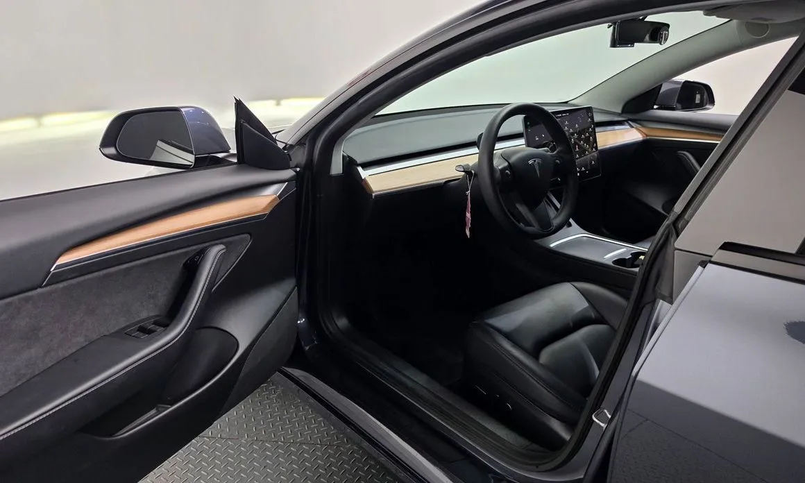 Tesla Model 3 — фото 8