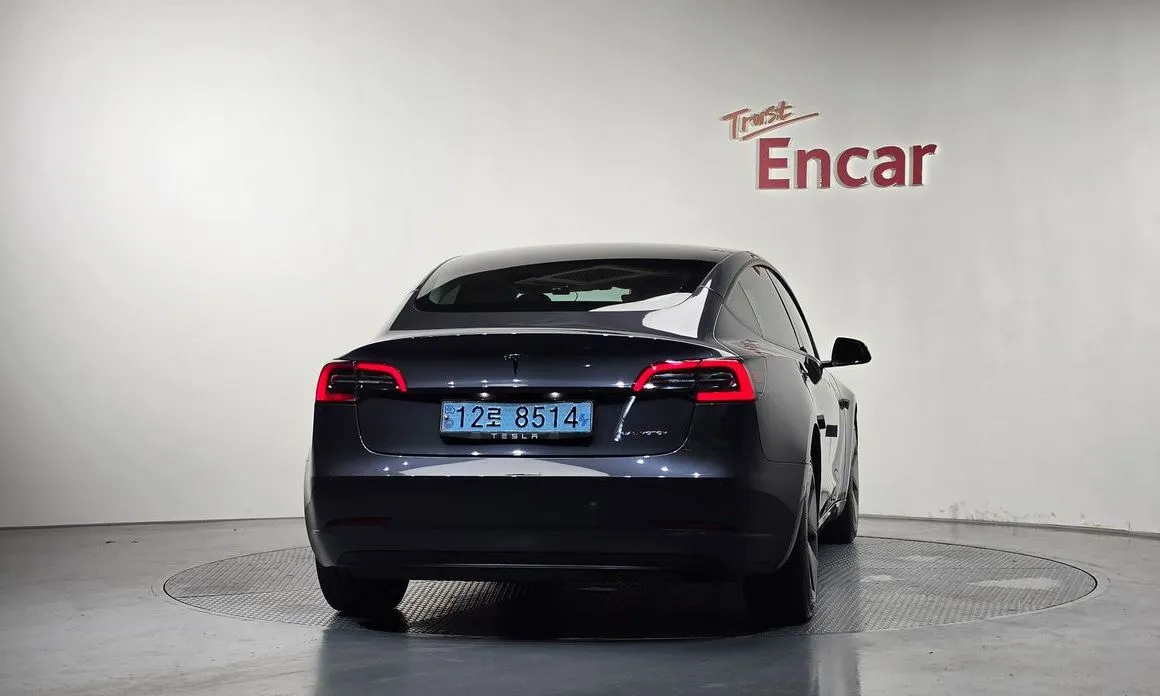 Tesla Model 3 — фото 5