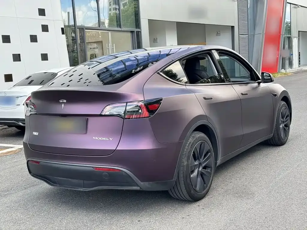 Tesla Model Y — фото 10