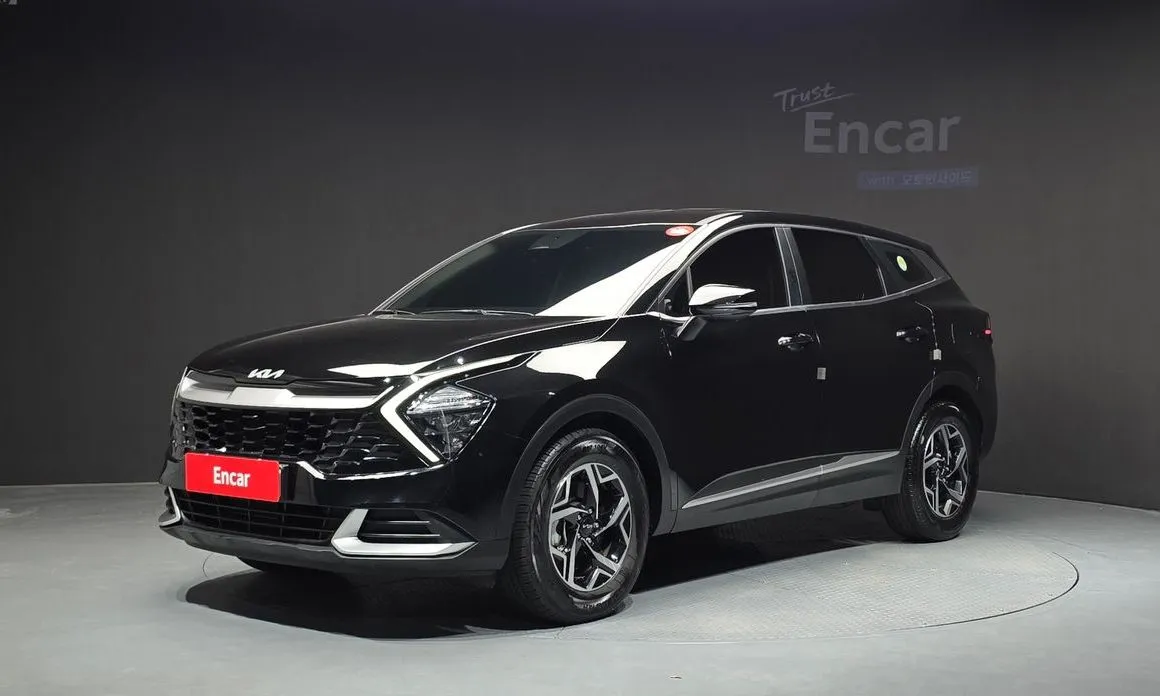 Kia Sportage — фото 1