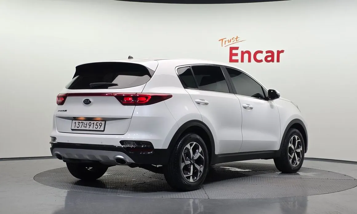 Kia Sportage — фото 7