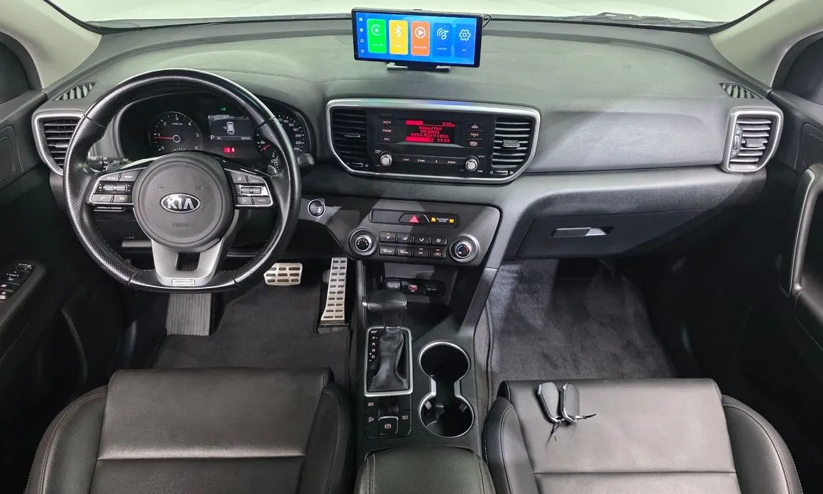 Kia Sportage — фото 9