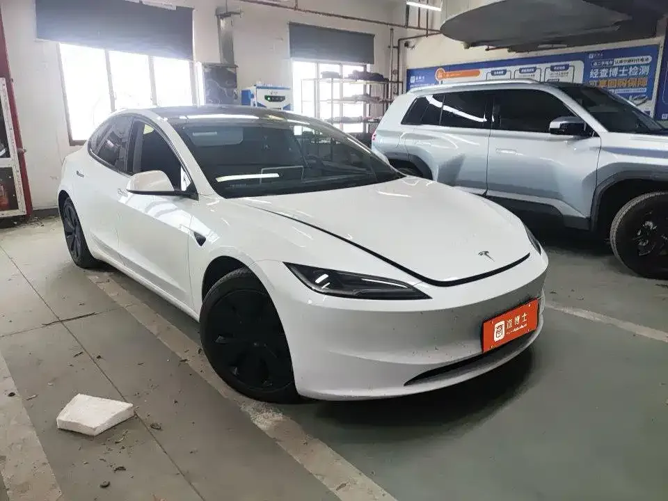 Tesla Model 3 — фото 10