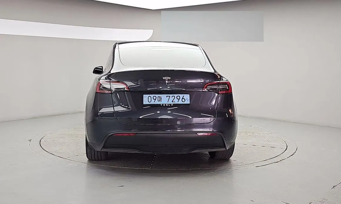 Tesla Model Y — фото 7