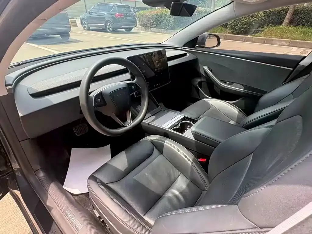 Tesla Model 3 — фото 7
