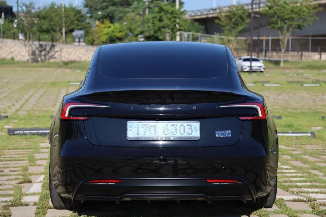 Tesla Model 3 — фото 9