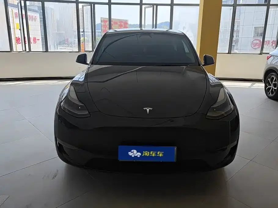 Tesla Model Y — фото 9