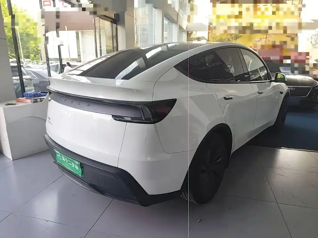 Tesla Model Y — фото 7