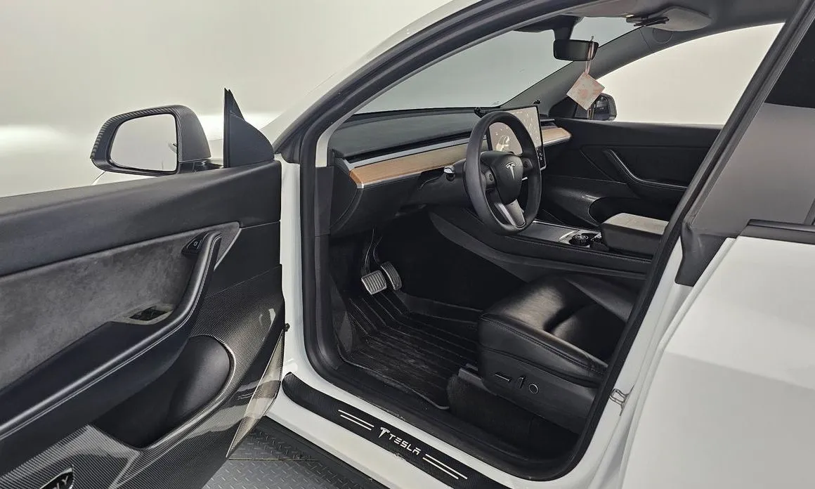 Tesla Model Y — фото 7