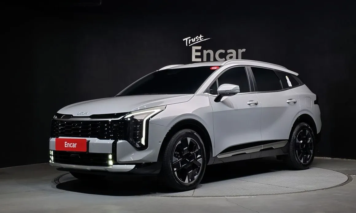 Kia Sportage — фото 1
