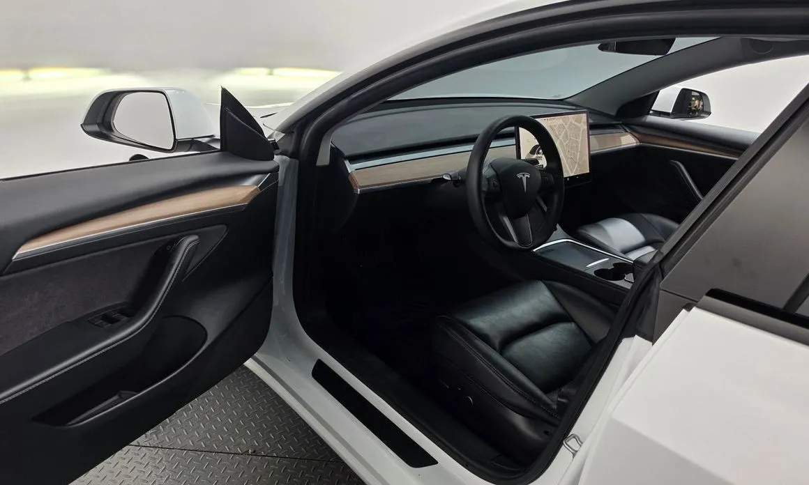 Tesla Model 3 — фото 7