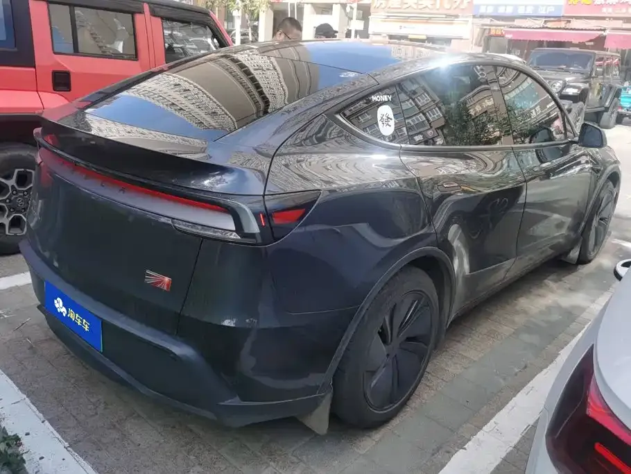 Tesla Model Y — фото 10