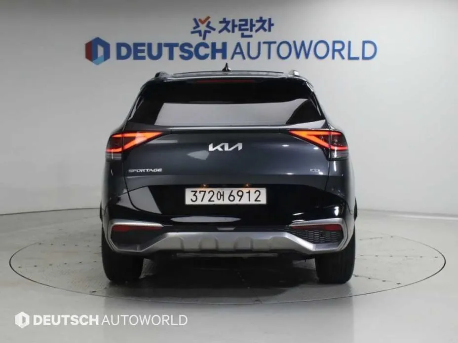 Kia Sportage — фото 10
