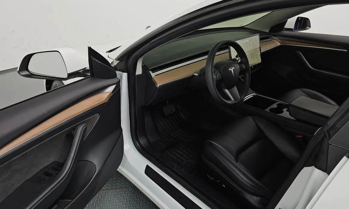 Tesla Model 3 — фото 6