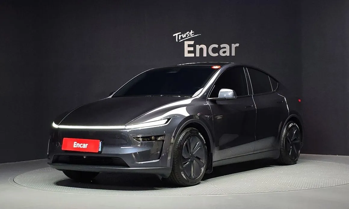 Tesla Model Y — фото 1