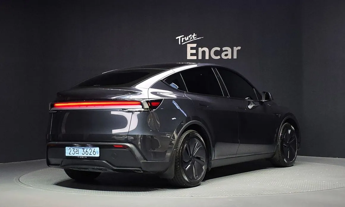 Tesla Model Y — фото 7