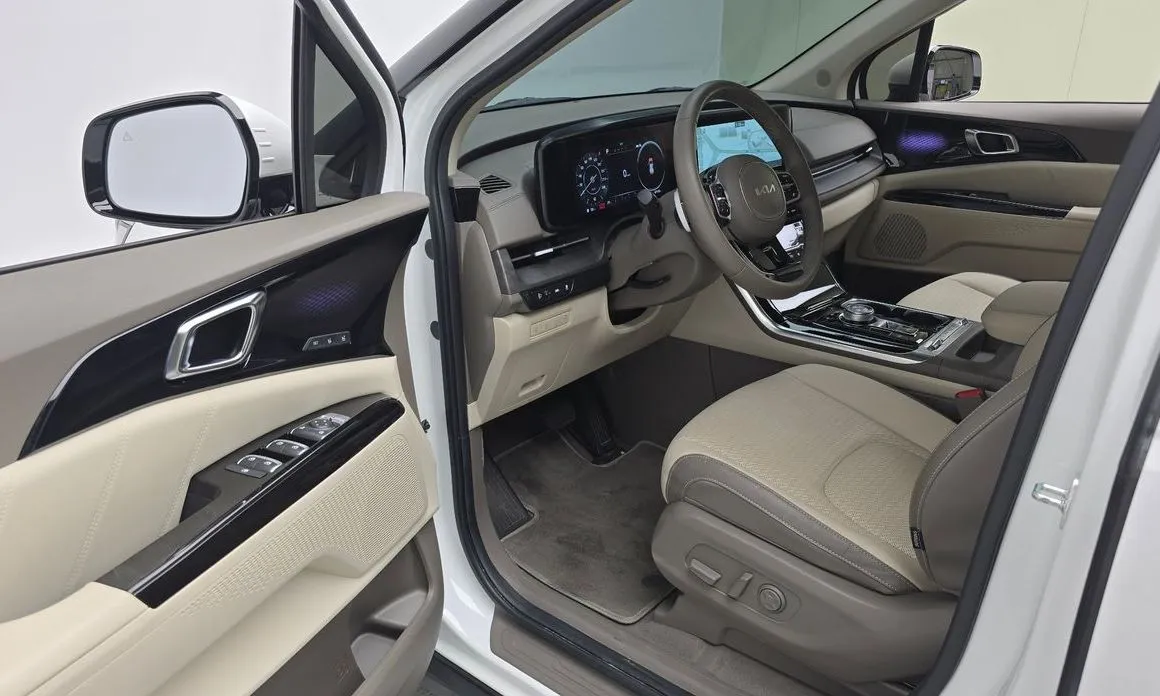 Kia Carnival — фото 10
