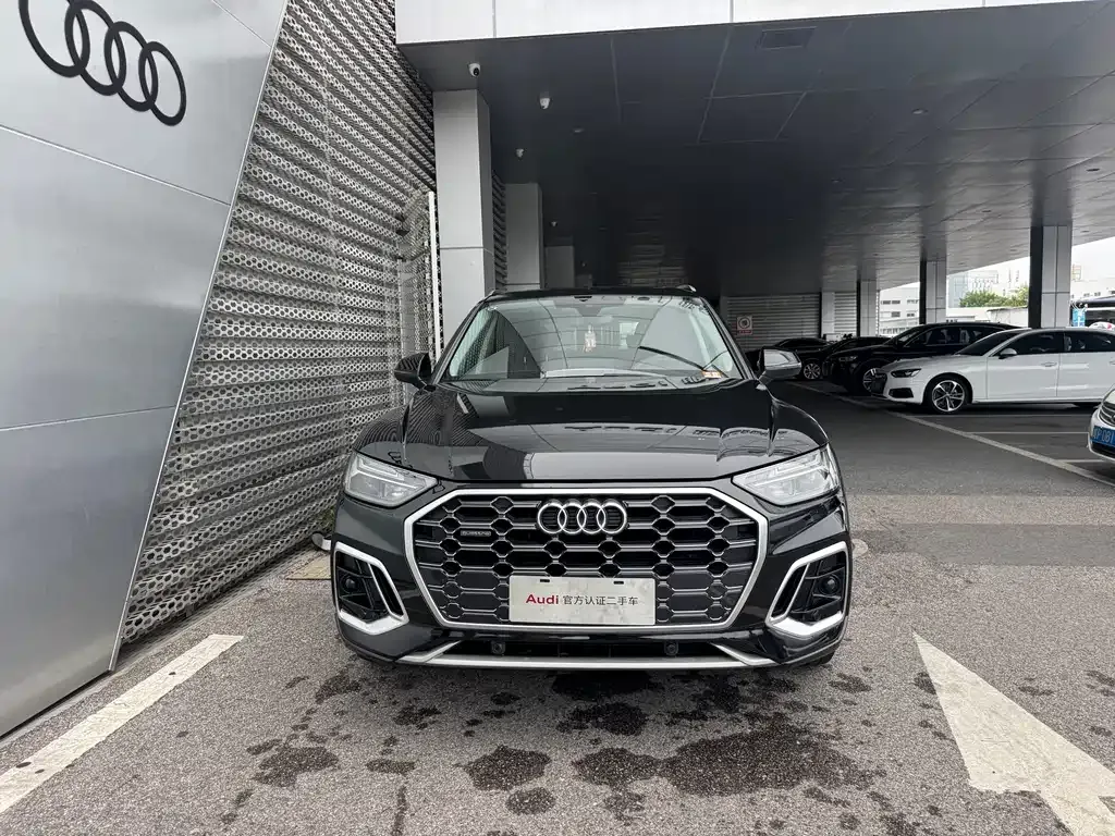 Audi Q5L — фото 10