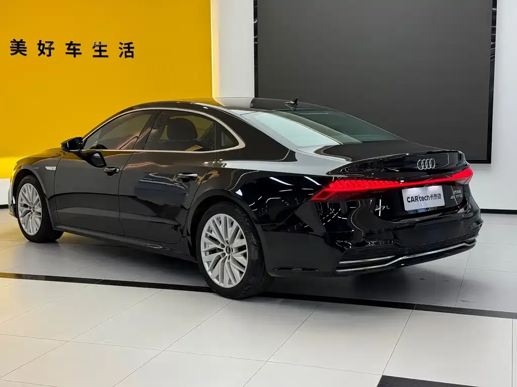 Audi A7L — фото 8