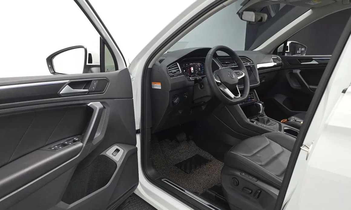 Volkswagen Tiguan — фото 7