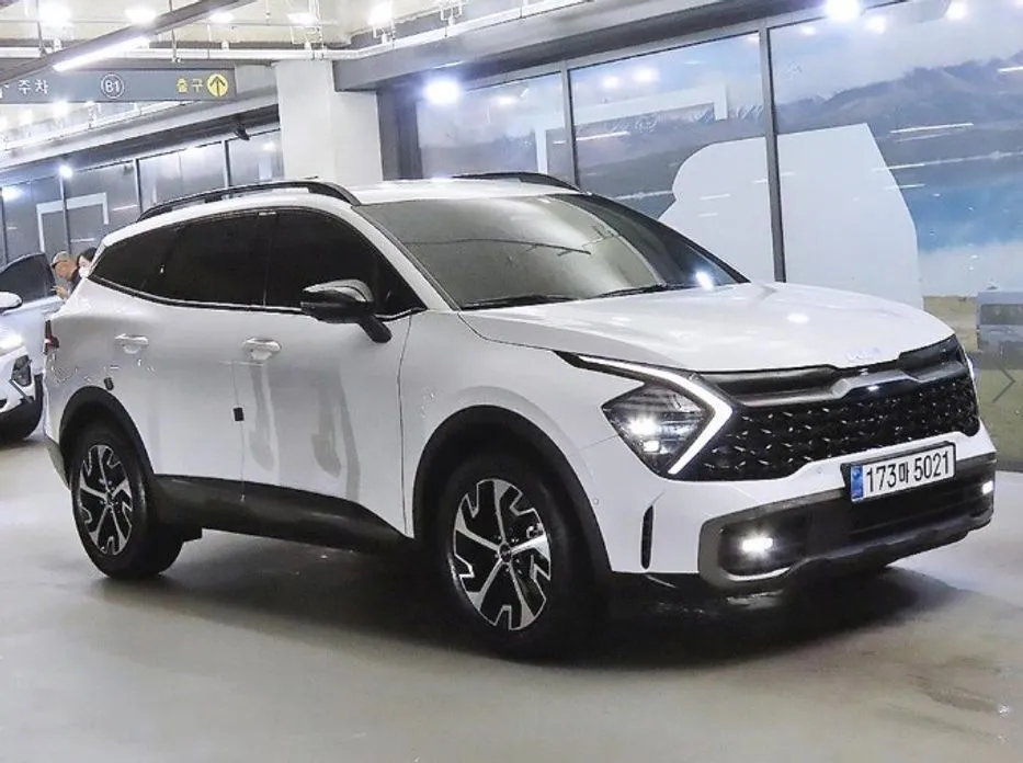 Kia Sportage — фото 1