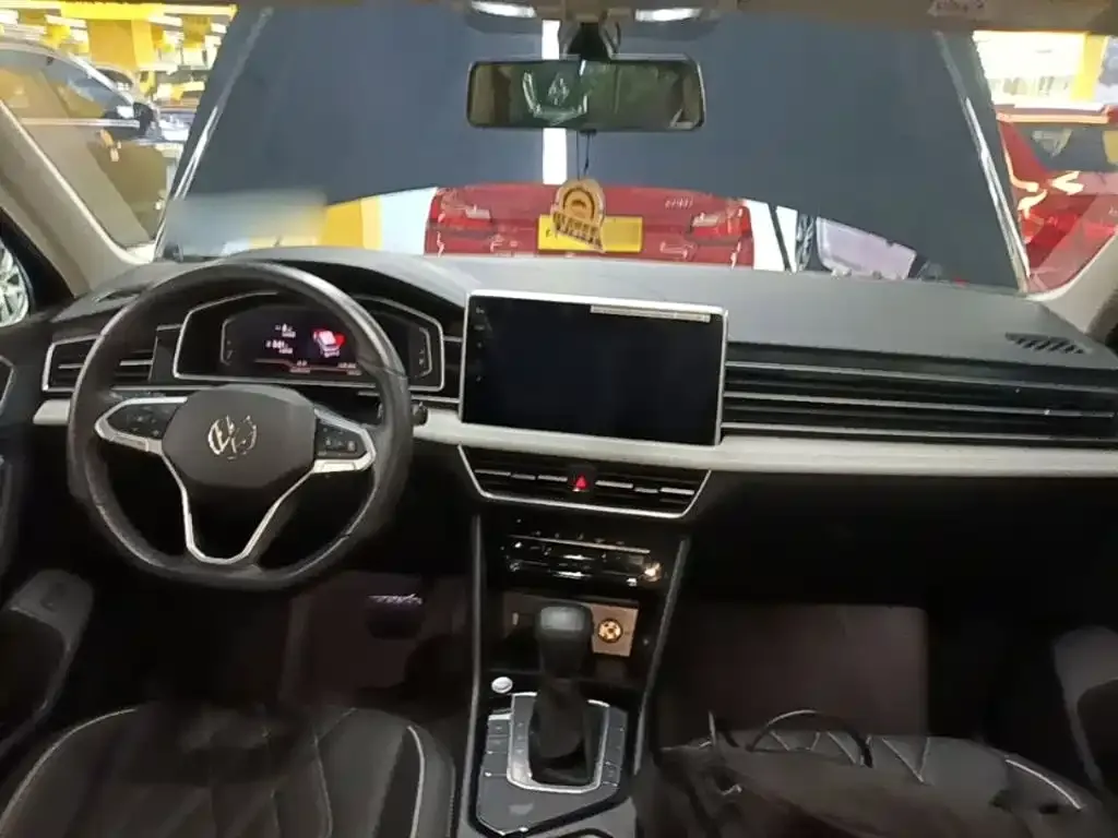 Volkswagen Tiguan L — фото 4