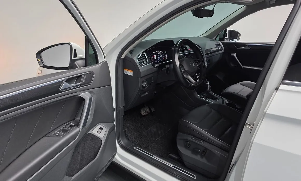Volkswagen Tiguan — фото 6