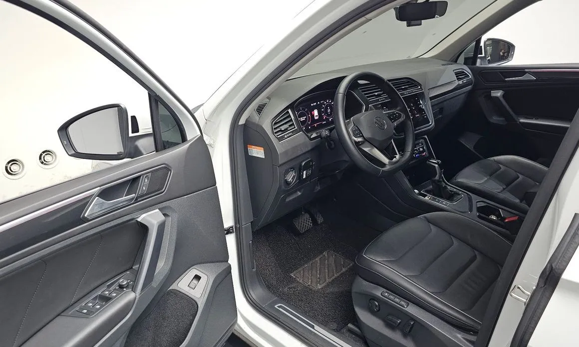 Volkswagen Tiguan — фото 6