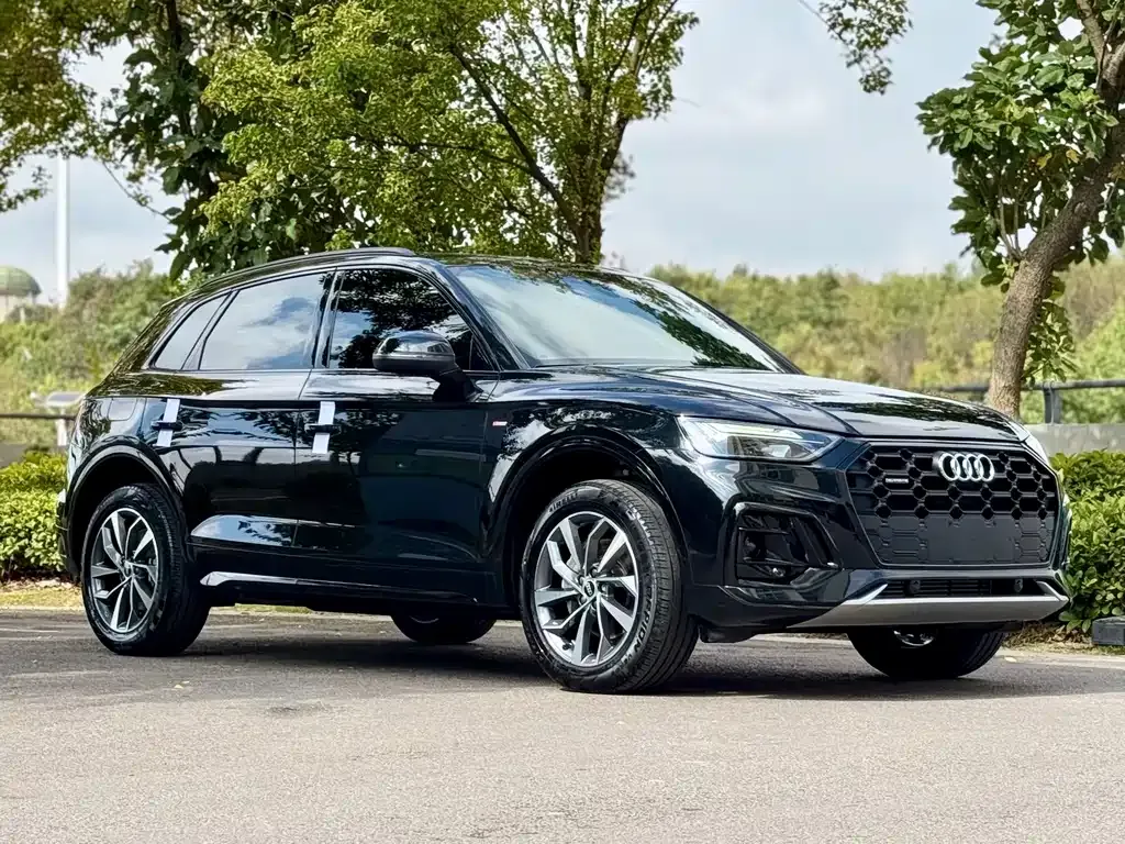 Audi Q5L — фото 7