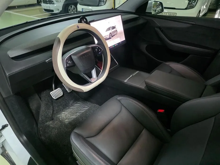 Tesla Model Y — фото 10