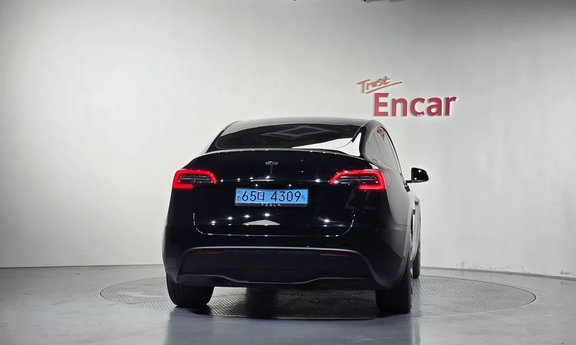 Tesla Model Y — фото 7
