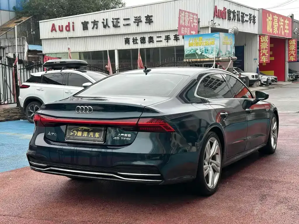Audi A7L — фото 9