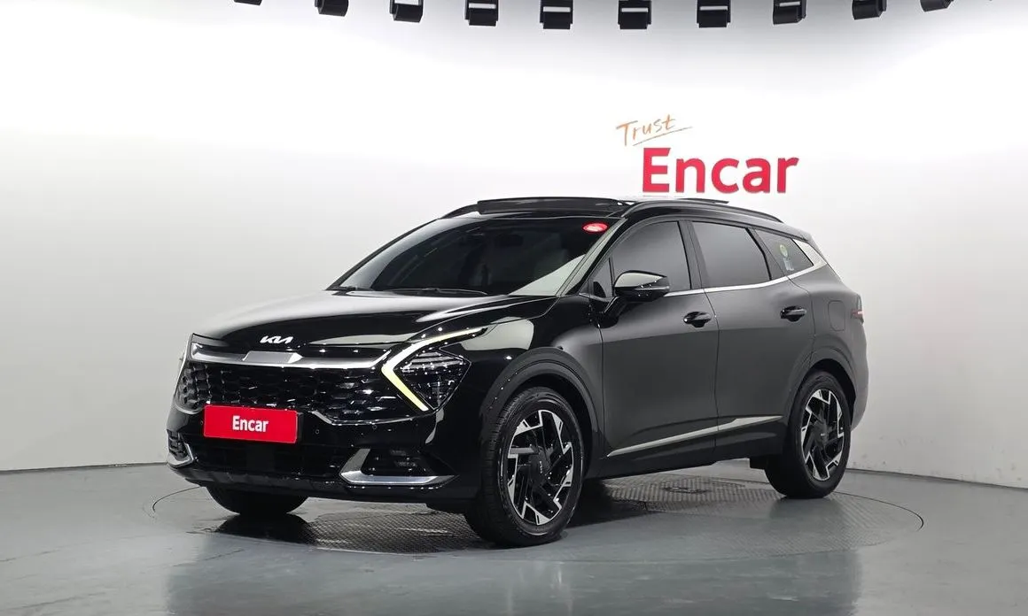 Kia Sportage — фото 1