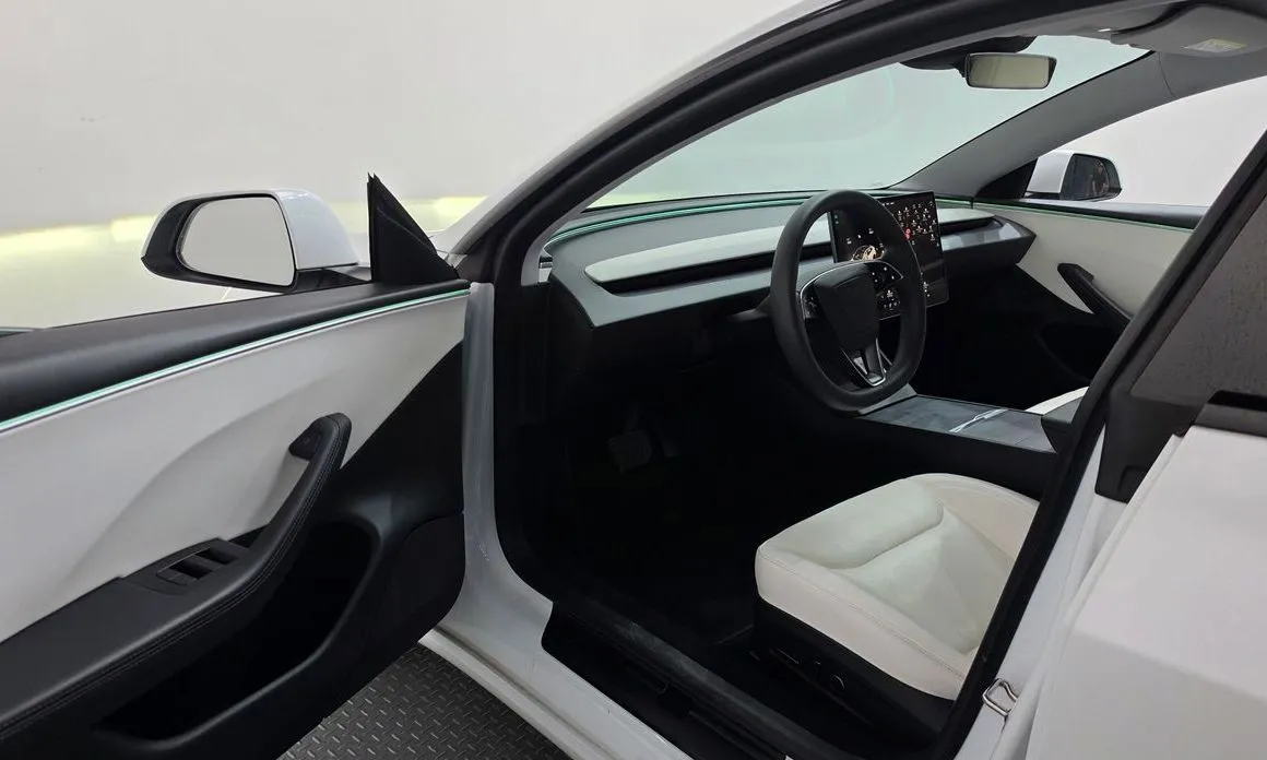 Tesla Model 3 — фото 10
