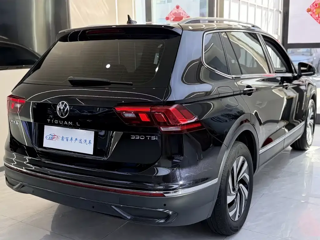 Volkswagen Tiguan L — фото 4