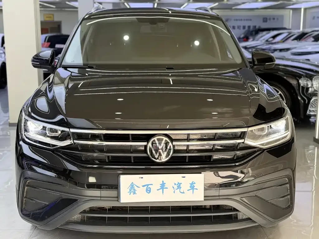 Volkswagen Tiguan L — фото 7