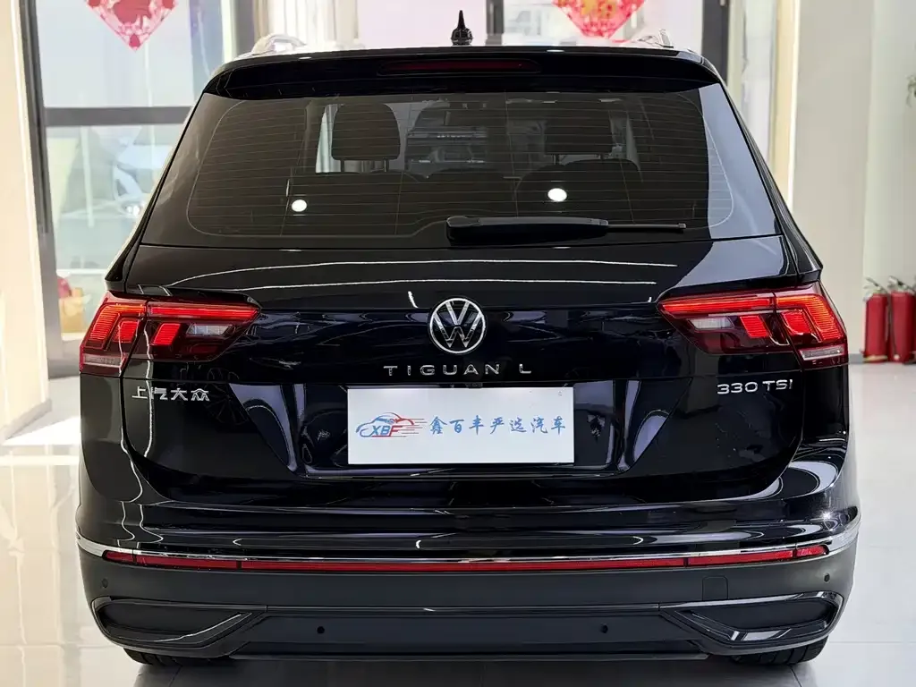 Volkswagen Tiguan L — фото 8